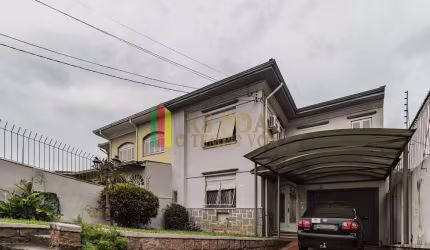 Casa com 3 quartos à venda na Rua Veador Porto, 251, Santana, Porto Alegre por R$ 849.900