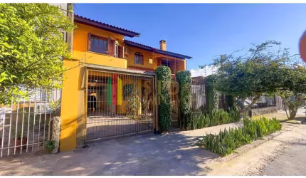 Casa com 4 quartos à venda na Rua Coronel Jaime da Costa Pereira, 340, Partenon, Porto Alegre por R$ 1.090.000