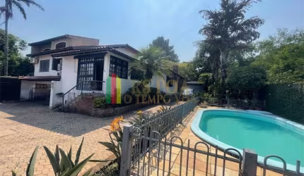 Casa em condomínio fechado com 4 quartos à venda na Rua Pedro A. A. de Freitas Filho, 186, Jardim Itu Sabará, Porto Alegre por R$ 1.200.000