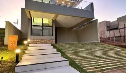 Casa à Venda Condomínio Terras Alpha em Uberlândia: 3 suítes, Salas amplas, 4 vagas, Sacada com vista permanente, Área gourmet