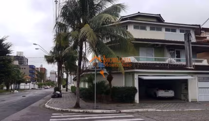 Sobrado com 4 dormitórios à venda, 280 m² por R$ 1.100.000,00 - Vila Guilhermina - Praia Grande/SP