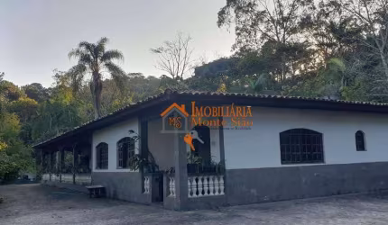 Chácara com 4 dormitórios à venda, 7000 m² por R$ 1.500.000,00 - Chácaras Copaco - Arujá/SP