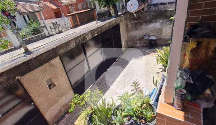 Excelente casa com 3 quartos, vaga e um terraço com churrasqueira!