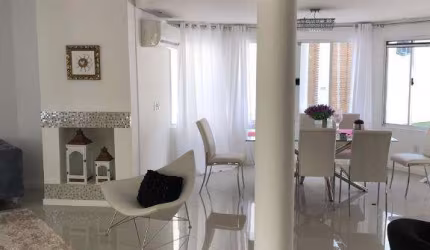 Casa com 4 dormitórios, 400 m² - venda por R$ 4.600.000,00 ou aluguel por R$ 10.208,33/dia - Jurerê Internacional - Florianópolis/SC