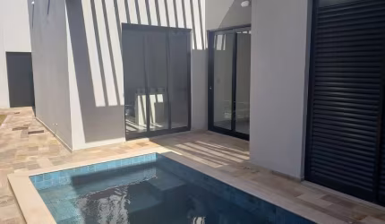 Casa em condomínio fechado com 3 quartos à venda no Grand Ville, Uberlândia  por R$ 1.250.000