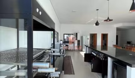 Casa com 6 dormitórios à venda, 377 m² por R$ 2.500.000,00 - Condomínio Reserva Ibirapitanga - Santa Isabel/SP
