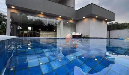 Casa com 3 dormitórios à venda, 384 m² por R$ 2.900.000,00 - Condomínio Reserva Ibirapitanga - Santa Isabel/SP