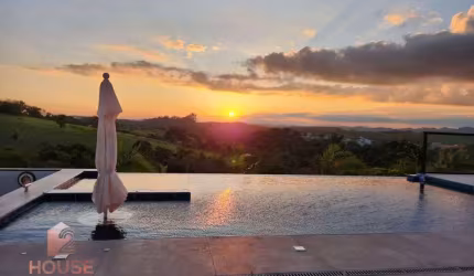 Casa com 3 dormitórios, 450 m² - venda por R$ 2.200.000,00 ou aluguel por R$ 12.070,00/mês - Condomínio Lago Dourado - Jacareí/SP