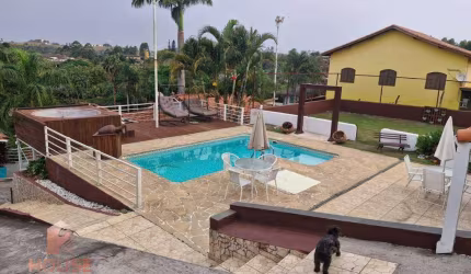 Casa com 3 dormitórios à venda, 840 m² por R$ 765.000,00 - Condomínio Mont Clair - Santa Isabel/SP