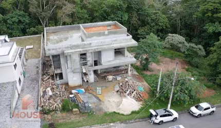 Casa com 4 dormitórios à venda, 361 m² por R$ 2.590.000,00 - Condomínio Reserva Ibirapitanga - Santa Isabel/SP
