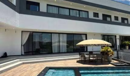 Casa com 4 dormitórios à venda, 690 m² por R$ 3.600.000 - Condomínio Reserva Ibirapitanga - Santa Isabel/SP