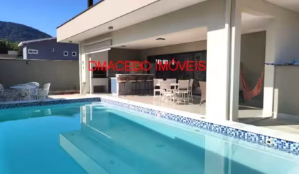 Casa em condomínio fechado com 4 quartos à venda na AVENIDA ENGENHO VELHO, 1390, Praia da Lagoinha, Ubatuba por R$ 1.750.000