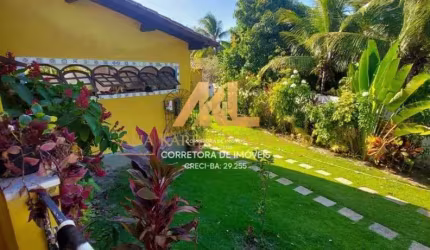 Casa em condomínio fechado com 4 quartos à venda na Rua Uirapuru, 1, Jauá, Camaçari por R$ 1.200.000
