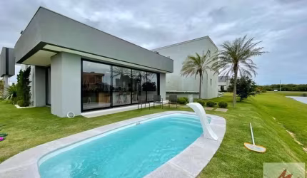 CASA MOBILIADA A VENDA EM CONDOMINIO RESERVA DAS AGUAS EM TORRES-RS.