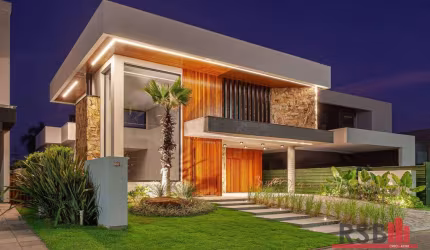 Casa com 3 dormitórios à venda, 256 m² por R$ 2.390.000 - Reserva das Aguas - Torres/RS