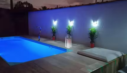 Casa com 3 dormitórios à venda, 221 m² por R$ 1.100.000 - Indaiá - Caraguatatuba