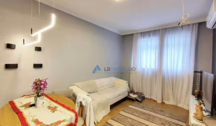 Apartamento térreo com 2 dormitórios à venda, 69 m² por R$ 430.000 - Campo Grande - Santos/SP