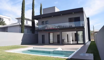Casa à venda com 4 suítes e  piscina condomínio Figueira Garden
