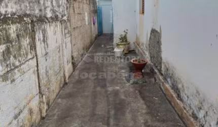 Terreno com 3 casas Vila Ideal