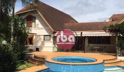 Linda casa no Condomínio Terras de São José I, com extensa área verde.