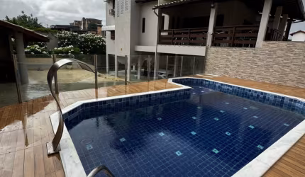 Casa Aconchegante com 4 Suítes, Piscina e Área Gourmet no Condomínio Jardim dos Pássaros - Estrada do Coco
