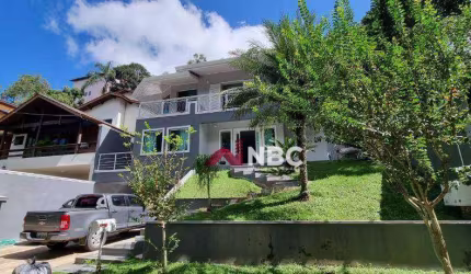 Casa com 4 dormitórios à venda, 298 m² por R$ 2.010.000,00 - Condomínio Country Club - Arujá/SP
