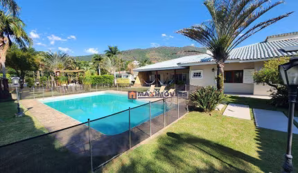 Casa com 7 dormitórios, 600 m² - venda por R$ 5.860.000 ou aluguel por R$ 21.800/mês - Condomínio Flamboyant - Atibaia/SP