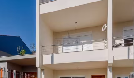 Casa em condomínio fechado com 3 quartos à venda na Rua Álamo, 72, Hípica, Porto Alegre por R$ 599.000