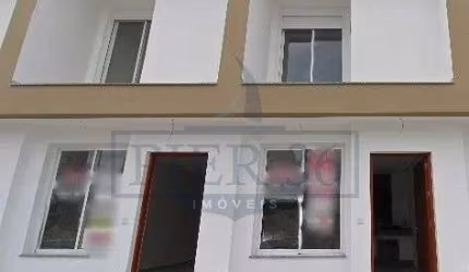 Casa com 2 quartos à venda na Rua Eroni Soares Machado, 473, Hípica, Porto Alegre por R$ 389.000