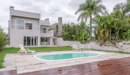 Casa em condomínio fechado com 4 quartos à venda na Avenida Juca Batista, 8000, Belém Novo, Porto Alegre por R$ 2.990.000