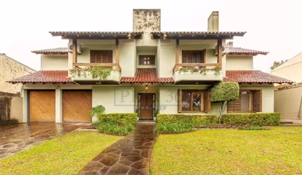 Casa com 3 quartos à venda na Travessa Nova Trento, 354, Tristeza, Porto Alegre por R$ 1.400.000