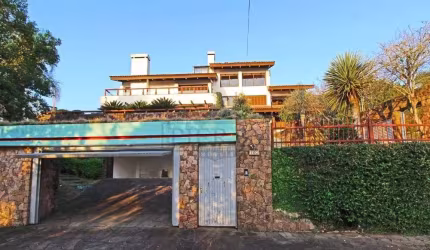 Casa com 4 quartos à venda na Rua Dona Lida Monteiro, 180, Teresópolis, Porto Alegre por R$ 1.890.000