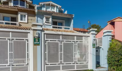 Casa com 3 quartos à venda na Rua Padre João Batista Reus, 1941, Camaquã, Porto Alegre por R$ 690.000