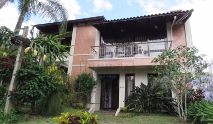 Casa com 4 quartos à venda na Rua Upamaroti, 836, Cristal, Porto Alegre por R$ 1.390.000