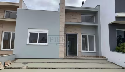 Casa em condomínio fechado com 2 quartos à venda na Rua Jean Vardaramatos, 130, Hípica, Porto Alegre por R$ 495.000