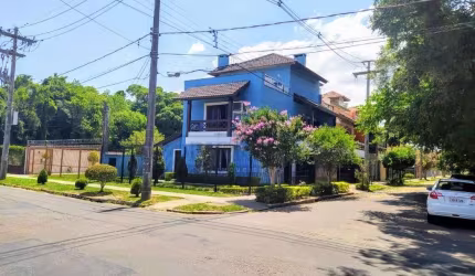 Casa com 3 quartos à venda na Avenida Guaíba, 11800, Ipanema, Porto Alegre por R$ 1.000.000