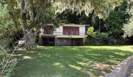 Casa com 3 quartos à venda na Rua Jacarandás, 136, Ponta Grossa, Porto Alegre por R$ 700.000