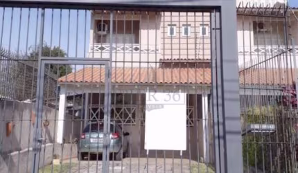 Casa com 3 quartos à venda na Rua dos Caiaguais, 91, Espírito Santo, Porto Alegre por R$ 1.070.000