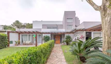 Casa em condomínio fechado com 5 quartos à venda na Avenida Coronel Marcos, 1334, Pedra Redonda, Porto Alegre por R$ 2.100.000