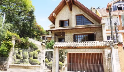 Casa com 3 quartos à venda na Rua Padre João Batista Reus, 629, Vila Conceição, Porto Alegre por R$ 980.000