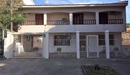 Casa com 4 quartos à venda na Rua Fonseca Ramos, 127, Medianeira, Porto Alegre por R$ 1.300.000
