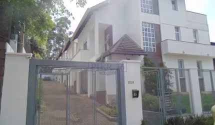 Casa em condomínio fechado com 3 quartos à venda na Rua Doutor Arnaldo da Silva Ferreira, 285, Jardim Isabel, Porto Alegre por R$ 940.000