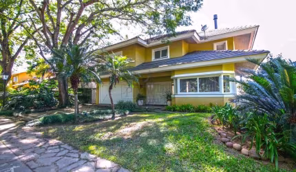 Casa em condomínio fechado com 4 quartos à venda na Avenida da Cavalhada, 5205, Cavalhada, Porto Alegre por R$ 2.940.000