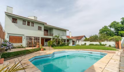Casa com 5 quartos à venda na Rua Caiapó, 15, Vila Assunção, Porto Alegre por R$ 2.600.000