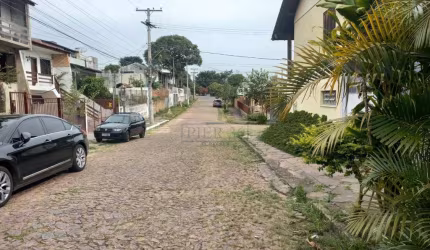 Terreno à venda na Rua Panambi, 226, Cavalhada, Porto Alegre por R$ 300.000