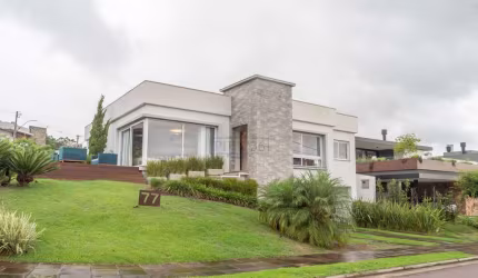 Casa em condomínio fechado com 3 quartos à venda na Estrada das Três Meninas, 1501, Vila Nova, Porto Alegre por R$ 2.450.000