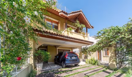Casa em condomínio fechado com 3 quartos à venda na Rua General Rondon, 99, Vila Assunção, Porto Alegre por R$ 1.500.000