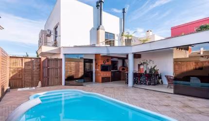Casa em condomínio fechado com 3 quartos à venda na Avenida Edgar Pires de Castro, 540, Hípica, Porto Alegre por R$ 1.150.000