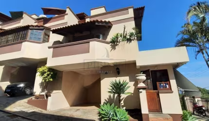 Casa em condomínio fechado com 3 quartos à venda na Avenida Wenceslau Escobar, 3714, Tristeza, Porto Alegre por R$ 590.000