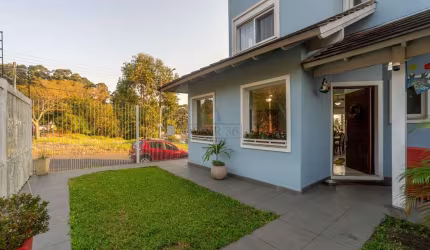 Casa com 3 quartos à venda na Rua Henrique Anawate, 470, Guarujá, Porto Alegre por R$ 950.000